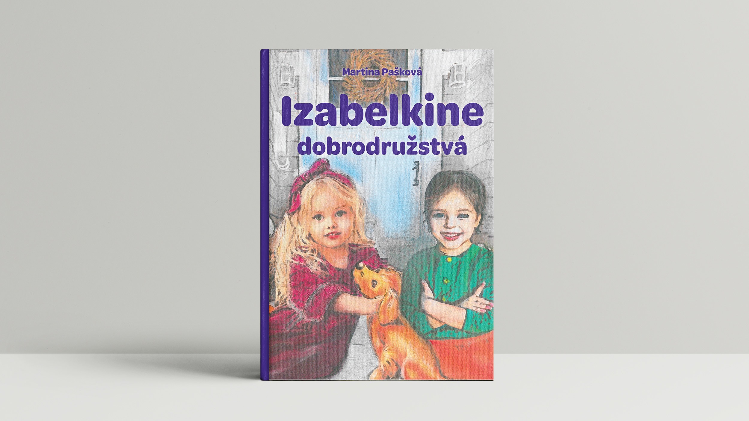 Obálka knihy Izabelkine dobrodružstvá. Na milej ilustrácii sú dve dievčatká a uprodsted psík.